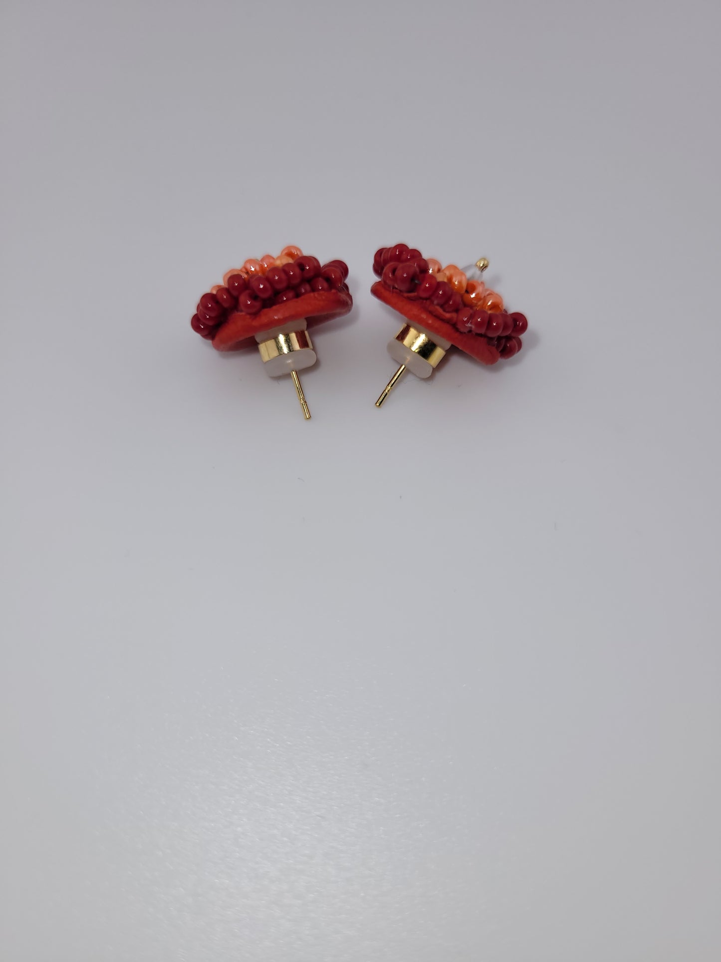 Bouton d'oreilles en perles de verre Pune